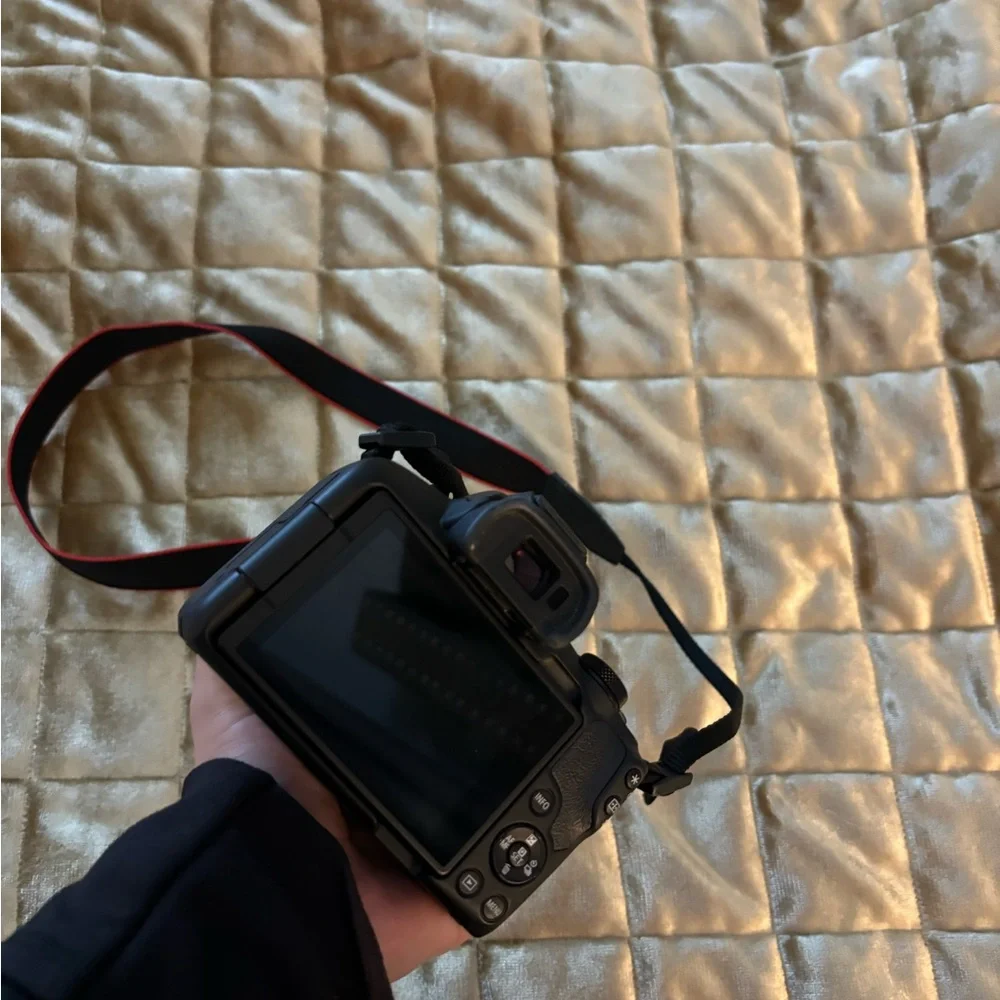 Canon EOS Black Digital Camera with Red Accents